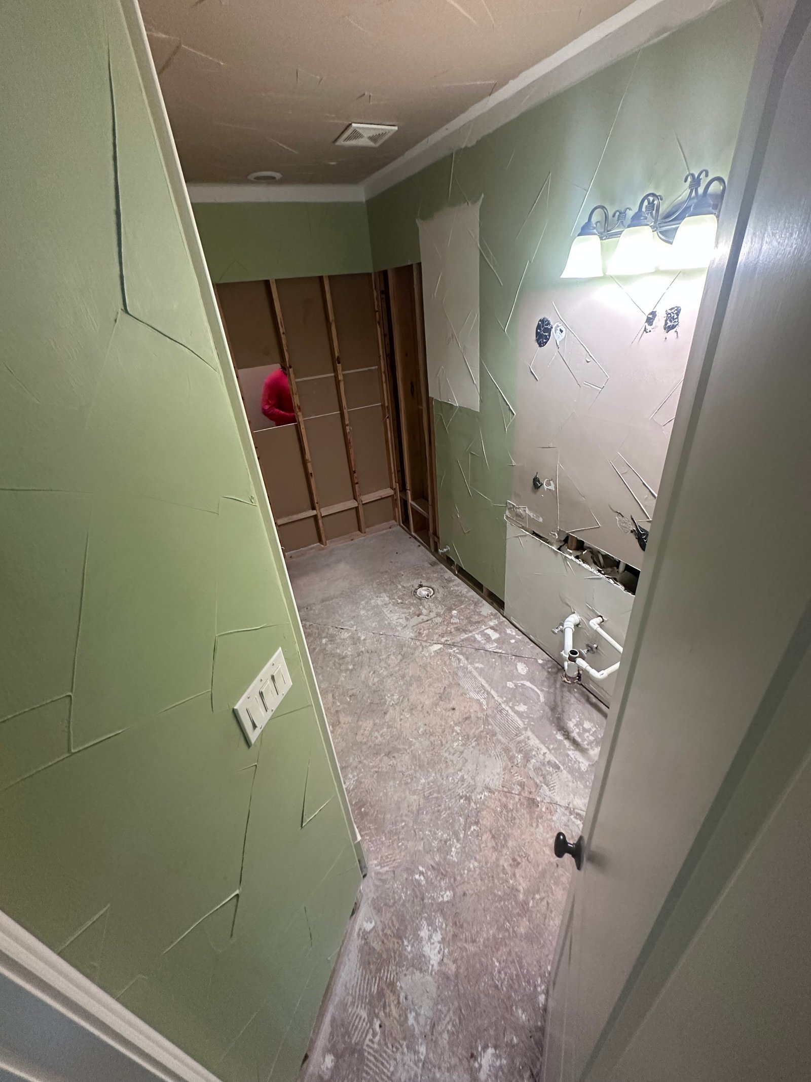 Bathroom floor taken down to the slab, JS Company LLC job