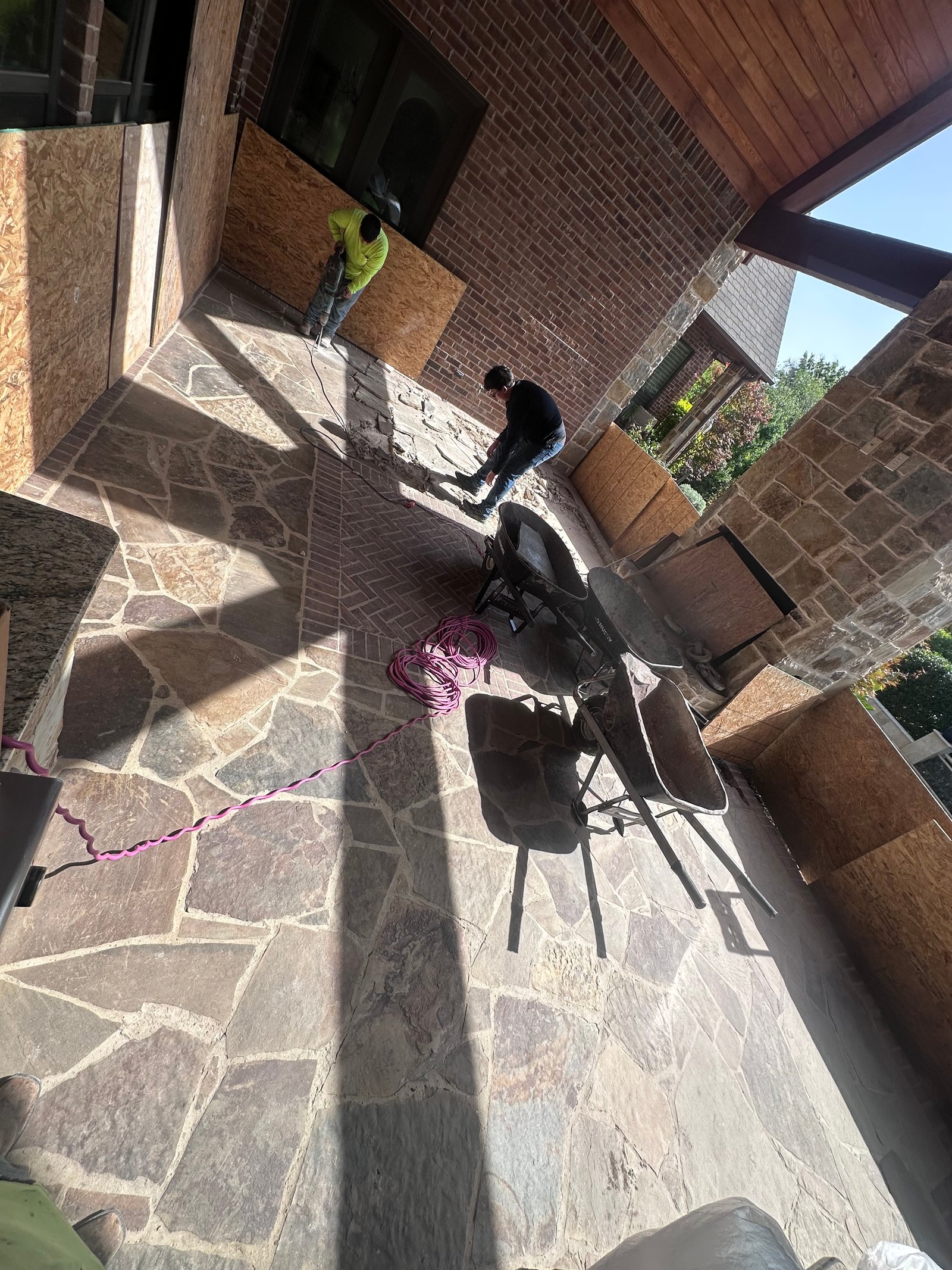 Flagstone patio floor coming up, JS Company LLC job